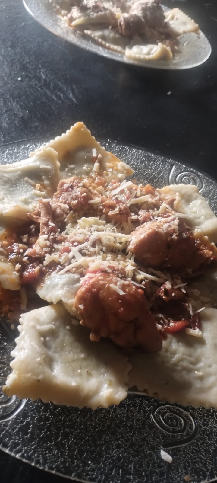 Raviolones con bondiola braseada